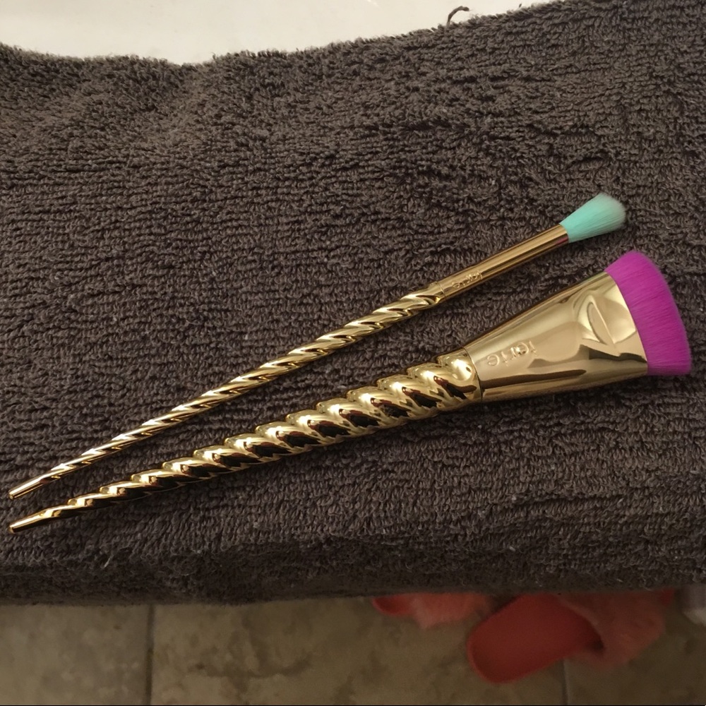 Two Tarte Unicorn brushes